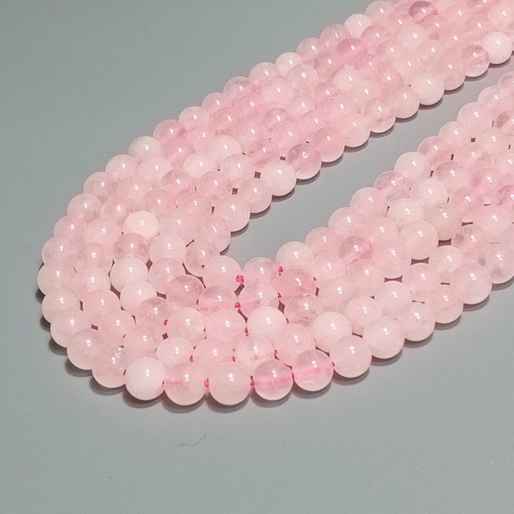 Бусины из розового кварца гладкие, диаметр 6-6.5мм, 60шт в нити. 