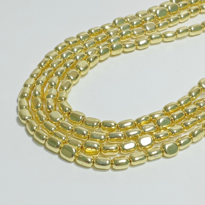 Бусины из гематита с золотистым покрытием, размер 5х6.5мм, 60шт. в нити