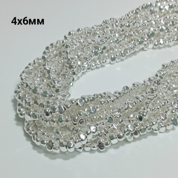 Бусины из гематита с серебристым покрытием 4х6мм, 117шт. в нити