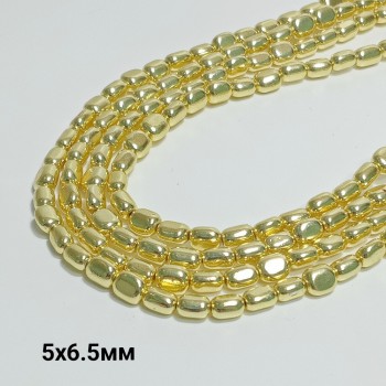 Бусины из гематита с золотистым покрытием, размер 5х6.5мм, 60шт. в нити